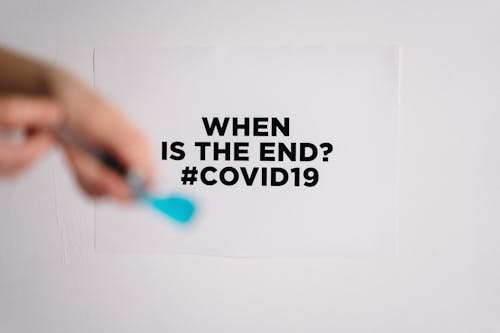 Free Coveid19 Text On Paper Stock Photo