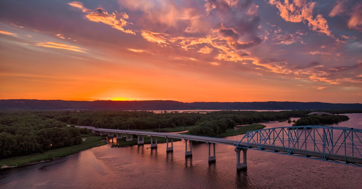 Beautiful sunset view of the Wabasha Bridge spanning the Mississippi River in Minnesota.