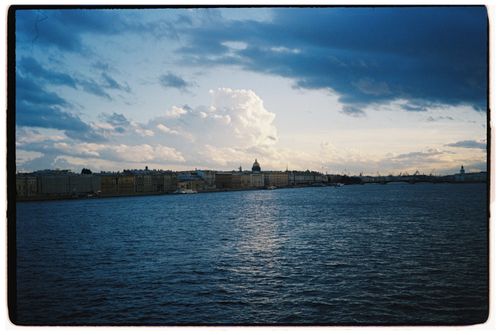 Free Stunning view of the St. Petersburg waterfront against a dramatic sky with picturesque clouds. Stock Photo