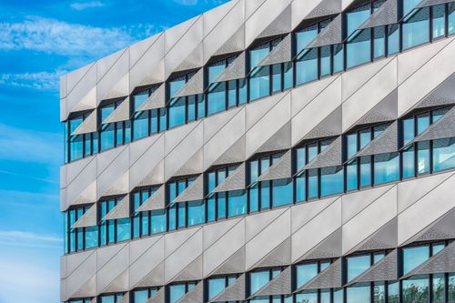 Free Close-up of a modern architectural facade with geometric design in Delft, Netherlands. Stock Photo