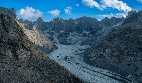 Free Breathtaking alpine view of Bregaglia's rugged mountains and glacier under a clear sky. Stock Photo