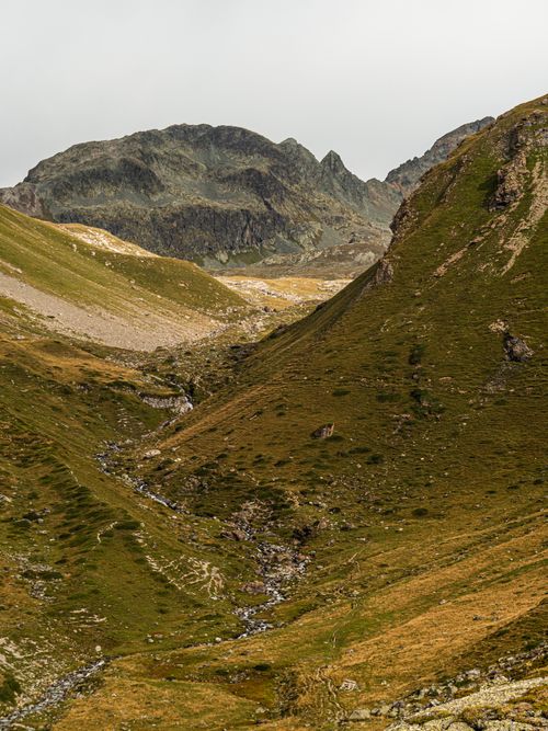 Free Idyllic mountain scenery in Surses, Graubünden, captured during a serene day. Stock Photo