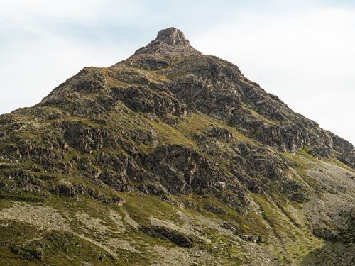 Free Explore the stunning mountain peak in Bregaglia, Switzerland, showcasing rugged terrain and natural beauty. Stock Photo
