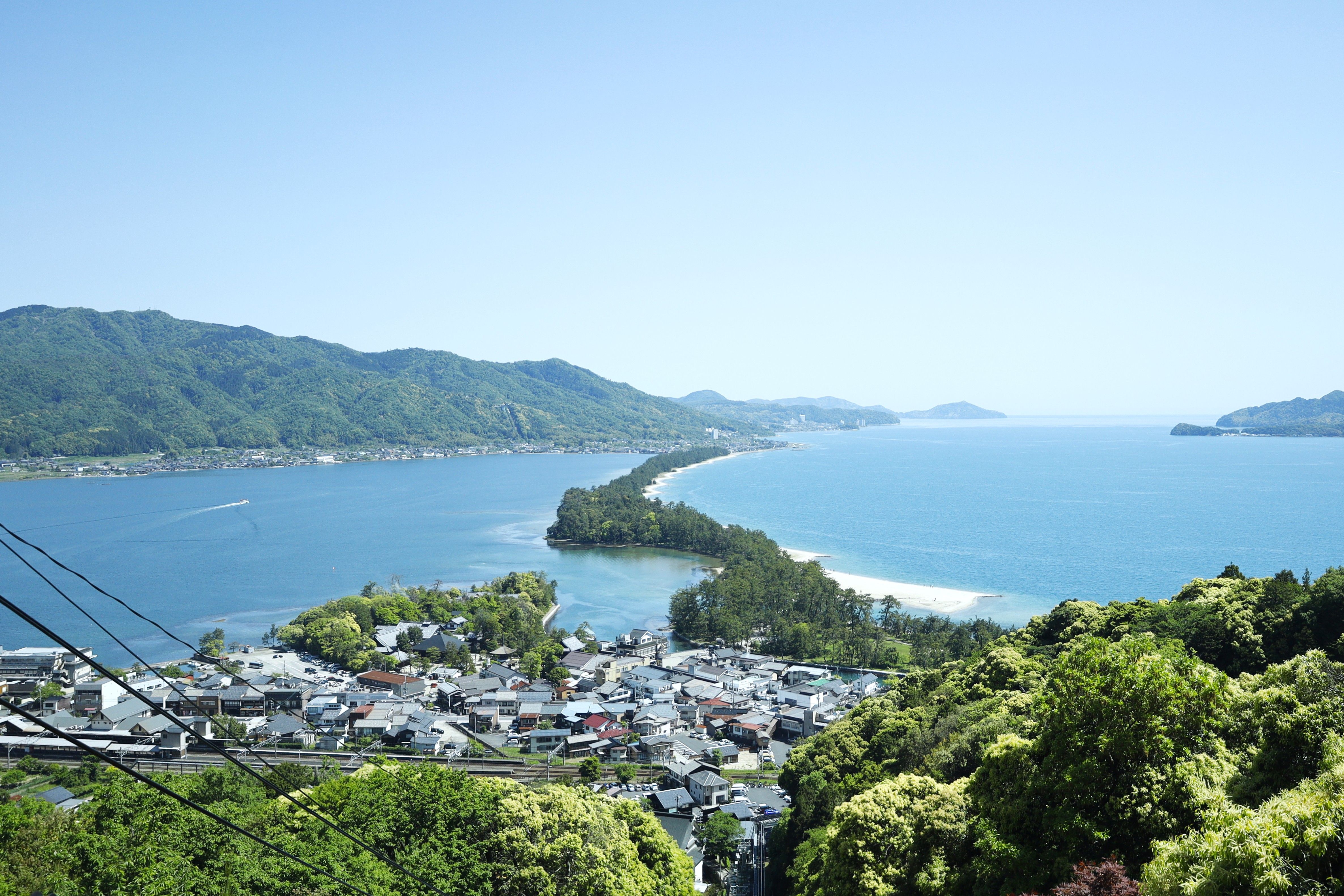 Explore the breathtaking Amanohashidate sandbar and lush landscapes in Miyazu, Kyoto, Japan.