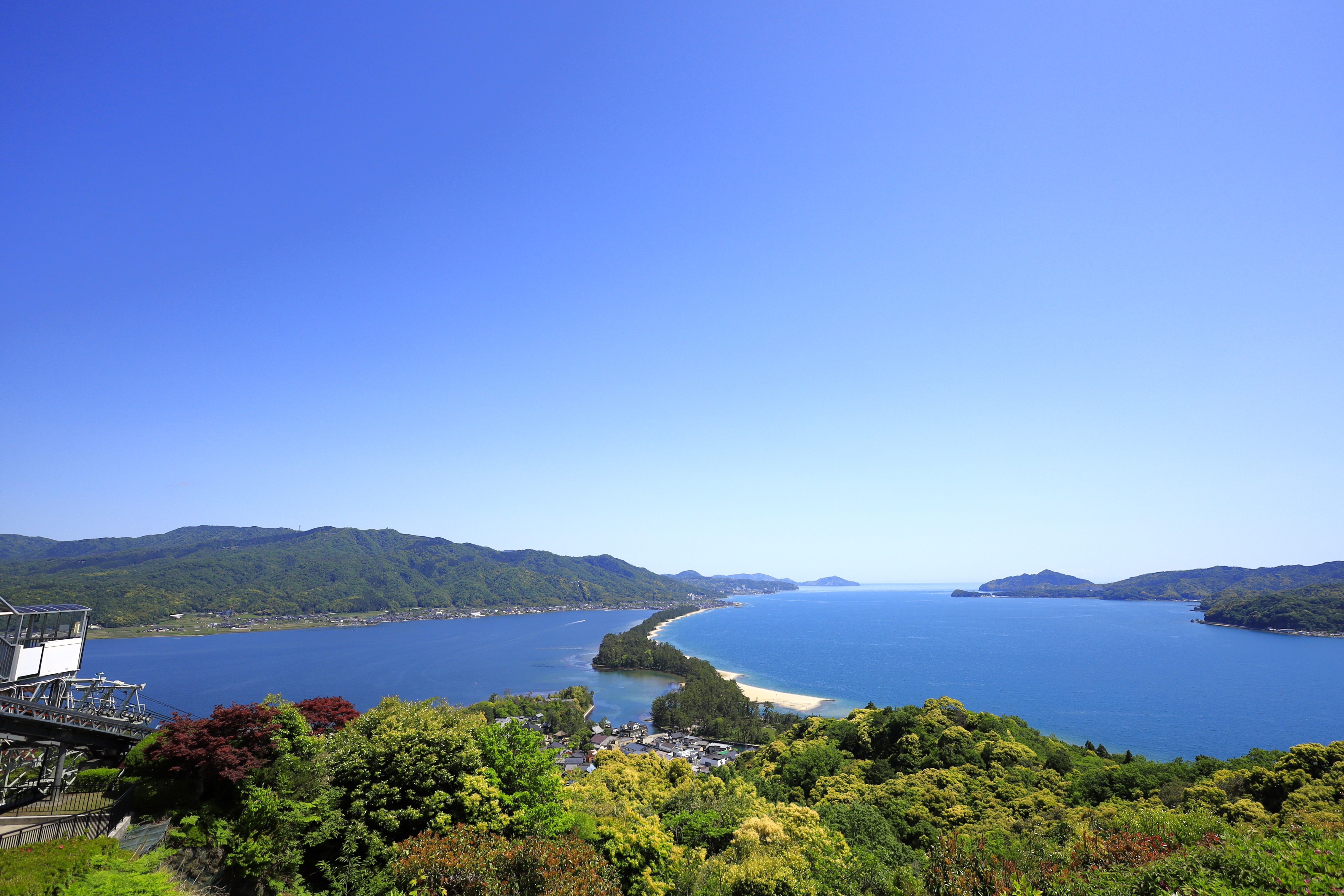 A breathtaking view of the famous Amanohashidate sandbar and surrounding landscapes in Miyazu, Japan.