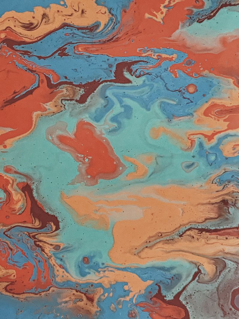 Combed marbling pattern in orange and blue