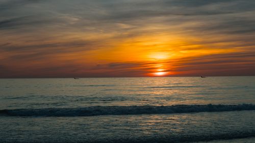 Free Beautiful sunset over the ocean in Quảng Trị, Vietnam, with vibrant colors and a serene atmosphere. Stock Photo