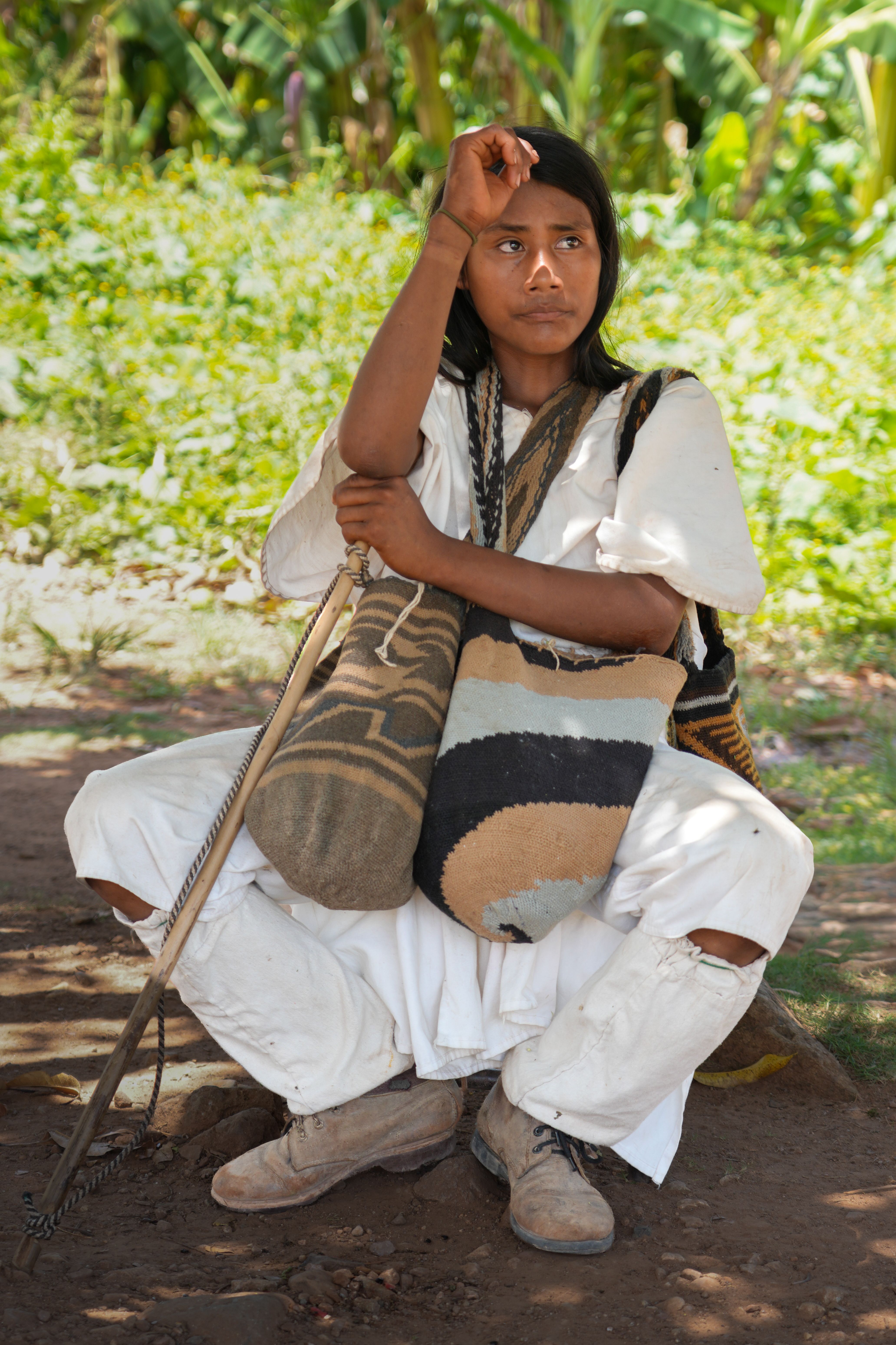 Portrait of an indigenous woman with traditional accessories in Pueblo Bello, Colombia.
