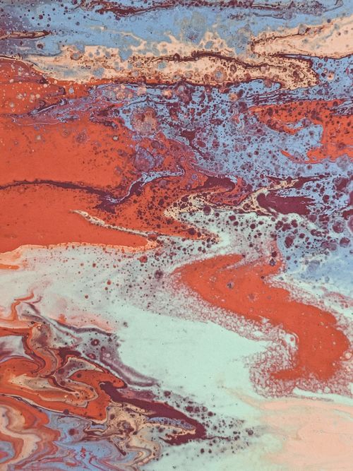Free A colorful abstract fluid art painting featuring red, blue, and white swirls, creating a dynamic and modern design. Stock Photo