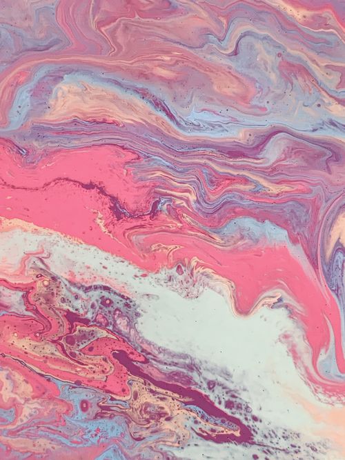 Free Colorful abstract marbling with pink, blue, and cream swirls. Perfect for artistic backgrounds. Stock Photo