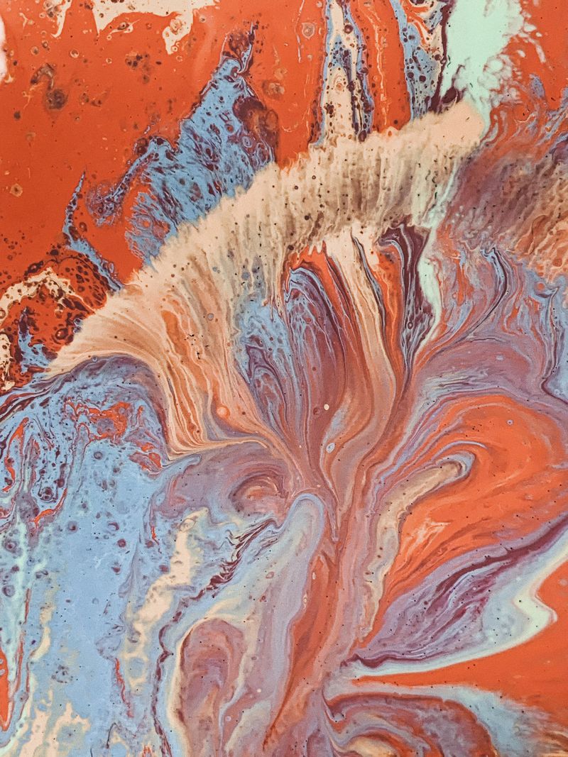 Marbled pattern in blue, red and cream