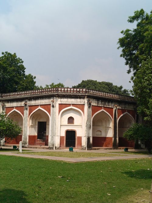 Free Stunning view of a historic Mughal architecture set against lush greenery in New Delhi, India. Stock Photo