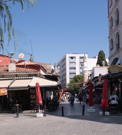 Free Explore the bustling streets of İzmir, Türkiye, with classic architecture and vibrant life. Stock Photo