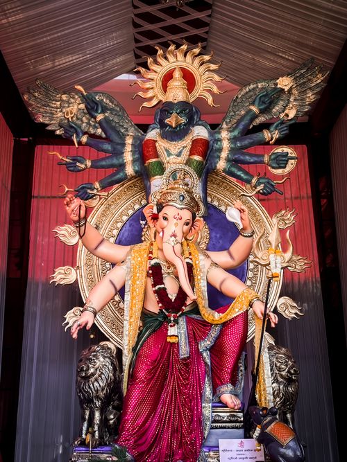 Free Intricate statue of Lord Ganesha with vibrant colors and detailed design, captured in Satara, India. Stock Photo