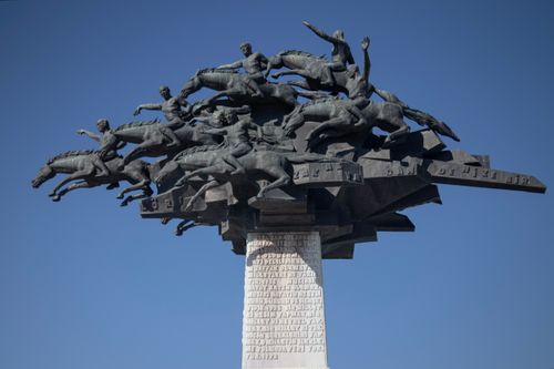 Free Monumental statue of Mustafa Kemal Ataturk in Izmir against a clear blue sky. Stock Photo