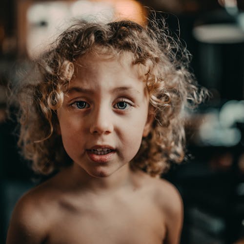 Free Shirtless Child With Curly Hair Stock Photo