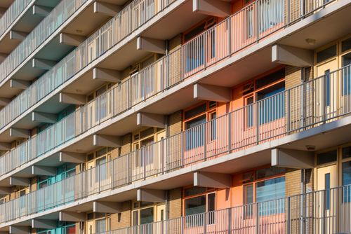 Free Vibrant apartment building facade with colorful balconies in Leiden, Netherlands. Stock Photo