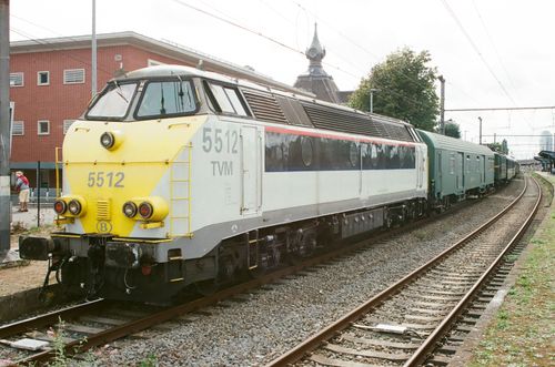 Free Classic train waiting at Schaerbeek station in Brussels, Belgium, showcasing railway charm. Stock Photo