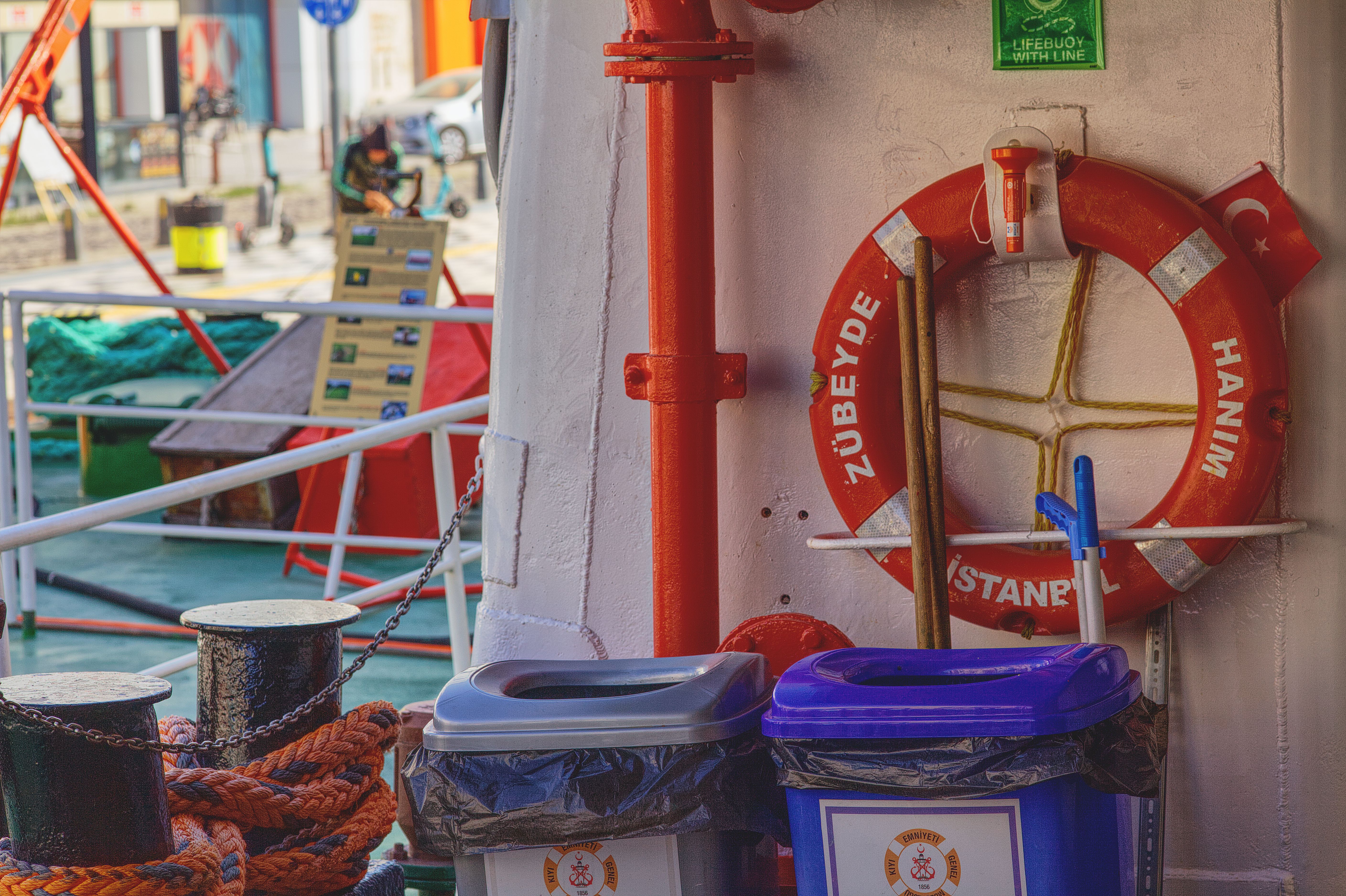 Colorful maritime scene with life-saving gear on a ferry in İzmir, Türkiye.