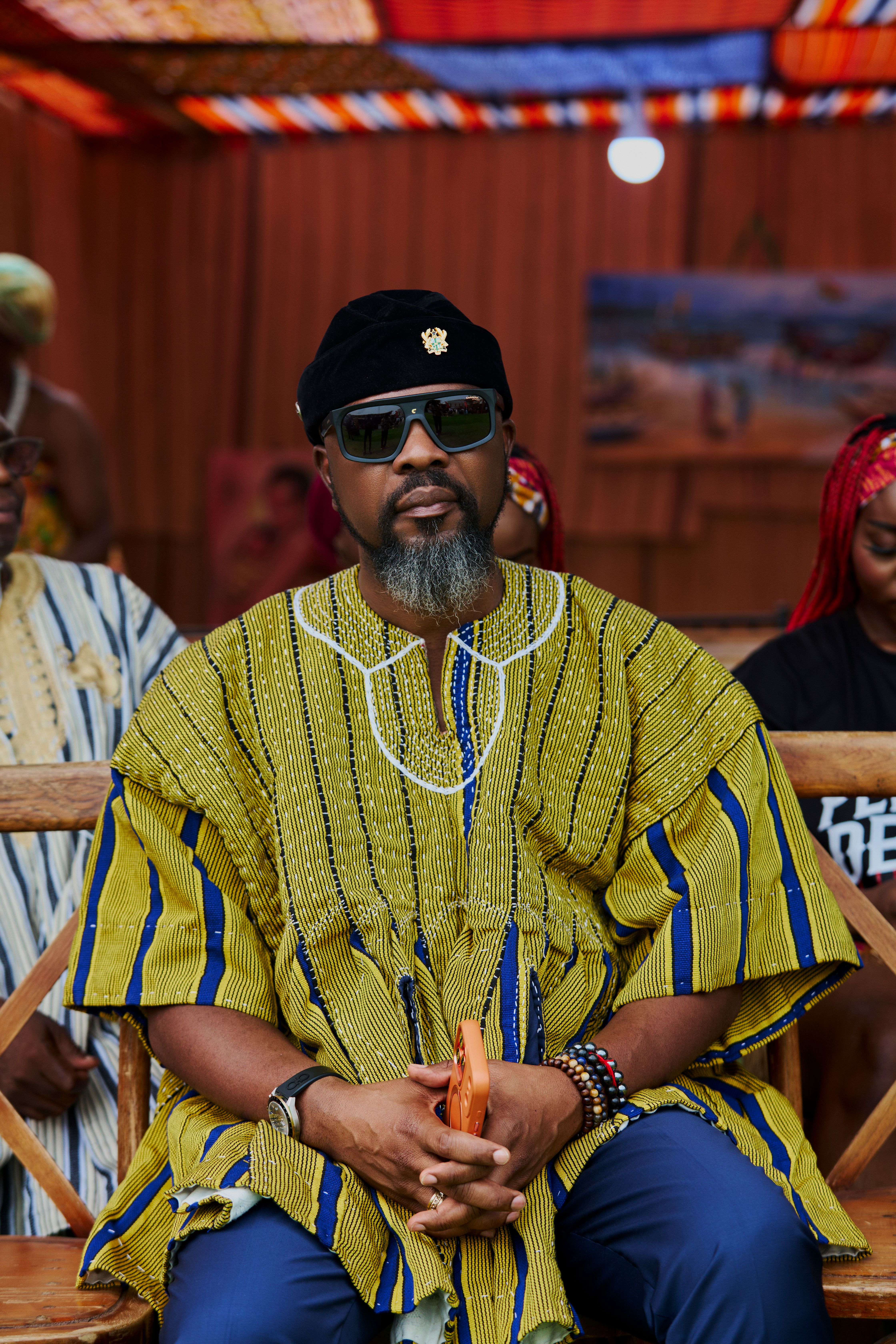 Man in traditional Ghanaian attire during a cultural event in Accra.