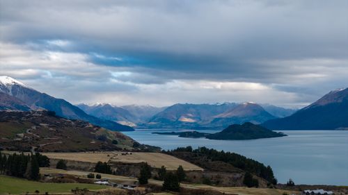 Free A captivating autumn landscape of Lake Wakatipu and surrounding mountains in New Zealand. Stock Photo