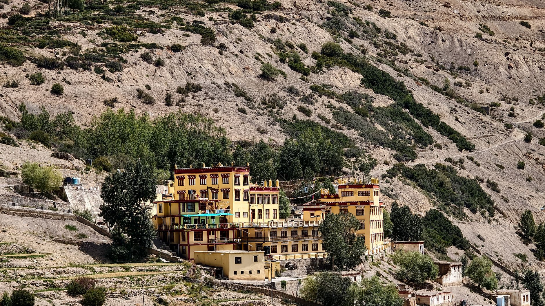 A scenic view of Tabo Monastery nestled in the arid landscape of Spiti Valley, India.