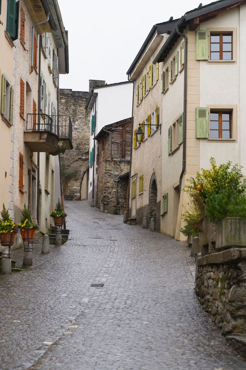 Free Explore the picturesque cobblestone streets and historic architecture of Saillon in Switzerland. Stock Photo