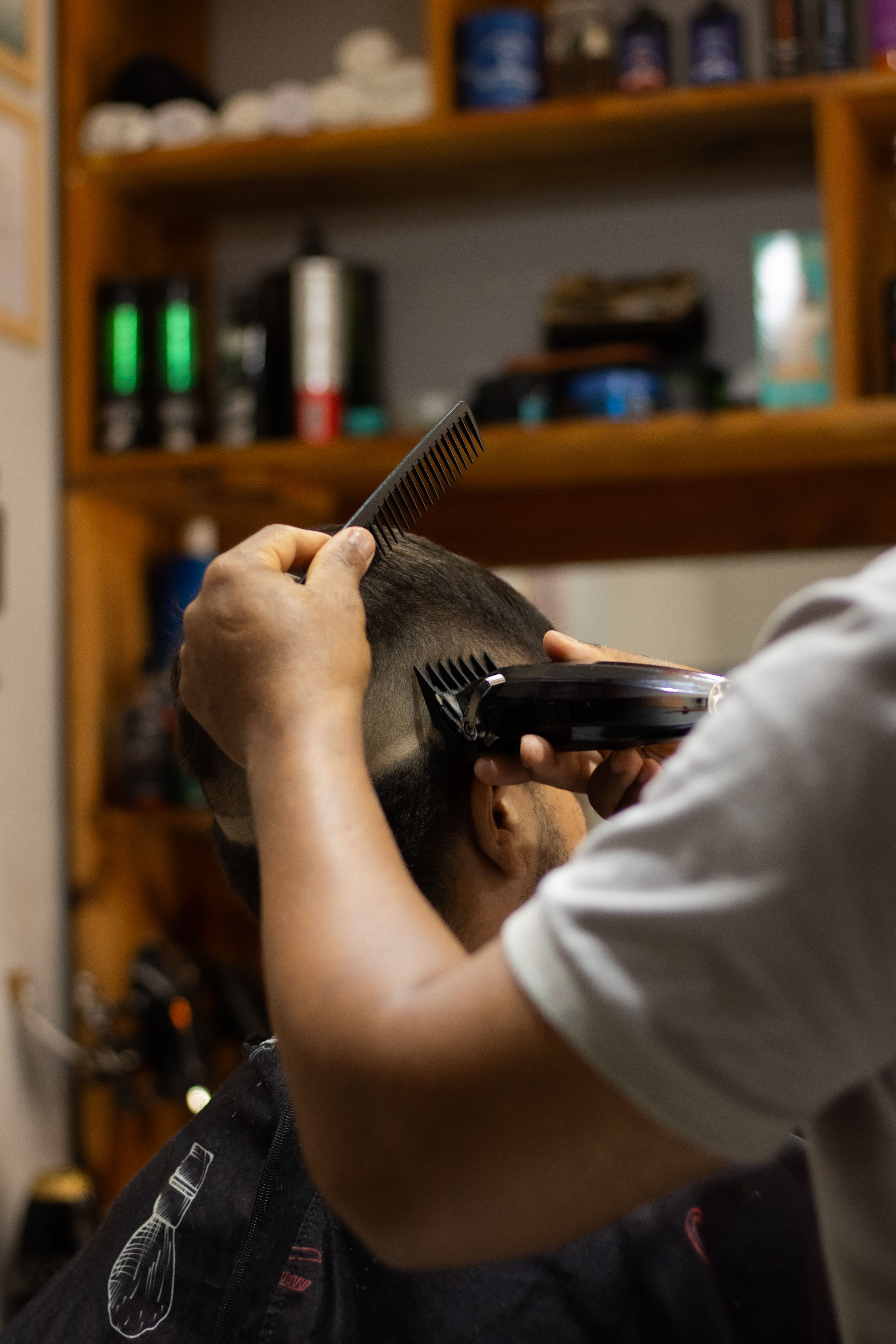 Coupe homme dégradée réalisée à la tondeuse