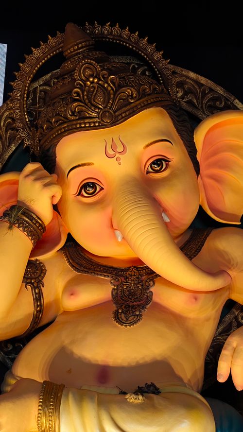 Free Close-up of a detailed Ganesha statue with vibrant colors and ornate design. Stock Photo