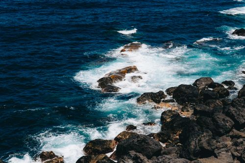 Free Dramatic waves crashing on rocky volcanic shores in Hermigua, Canary Islands. Stock Photo