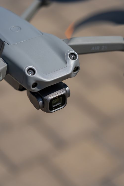 Free Detailed shot of a high-tech drone's camera lens in a daylight setting, highlighting sleek design. Stock Photo