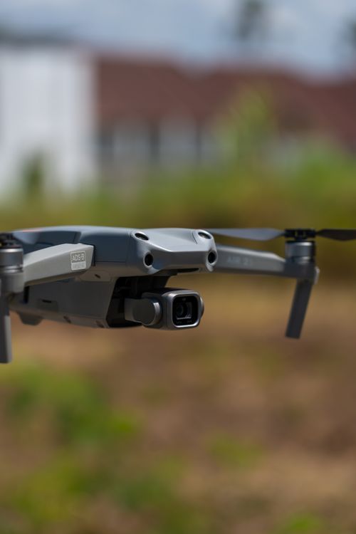 Free Close-up of a modern drone in flight on a sunny day, showcasing outdoor technology. Stock Photo