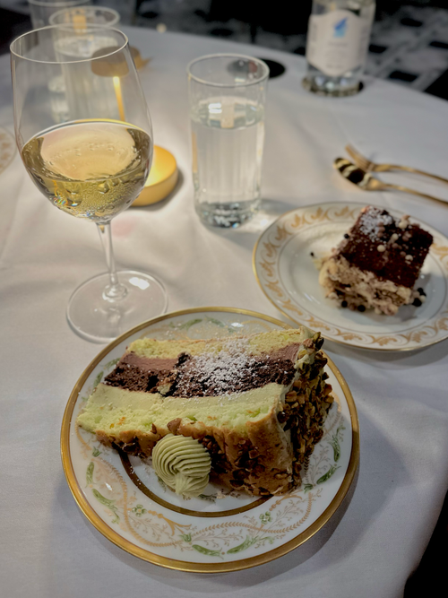 Free Elegant dessert and wine at a candlelit dinner table in Dallas, TX. Stock Photo