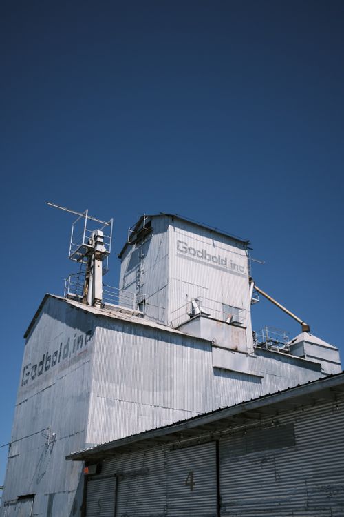 Free A metal industrial building in Marfa, Texas against a bright blue sky. Stock Photo