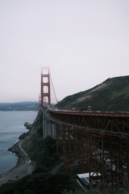 Free Misty view of the Golden Gate Bridge spanning over the bay in San Francisco, California. Stock Photo