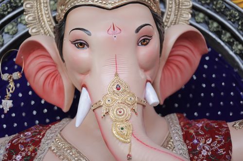 Free Close-up of a colorful and ornate Ganesh idol, showcasing rich cultural artistry. Stock Photo