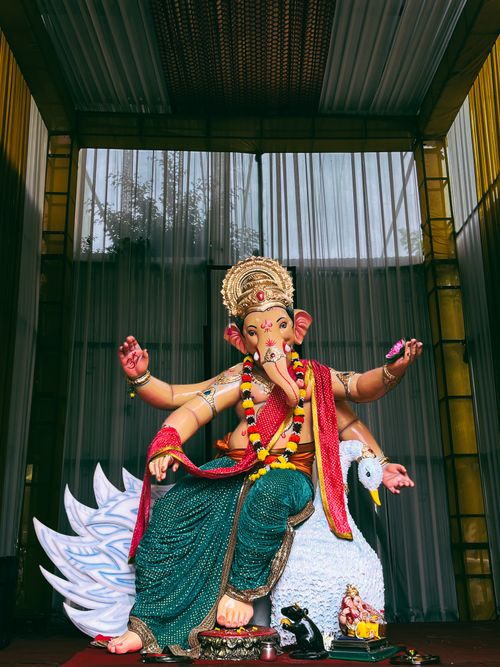 Free Colorful statue of Lord Ganesha with intricate details, showcasing cultural artistry indoors. Stock Photo