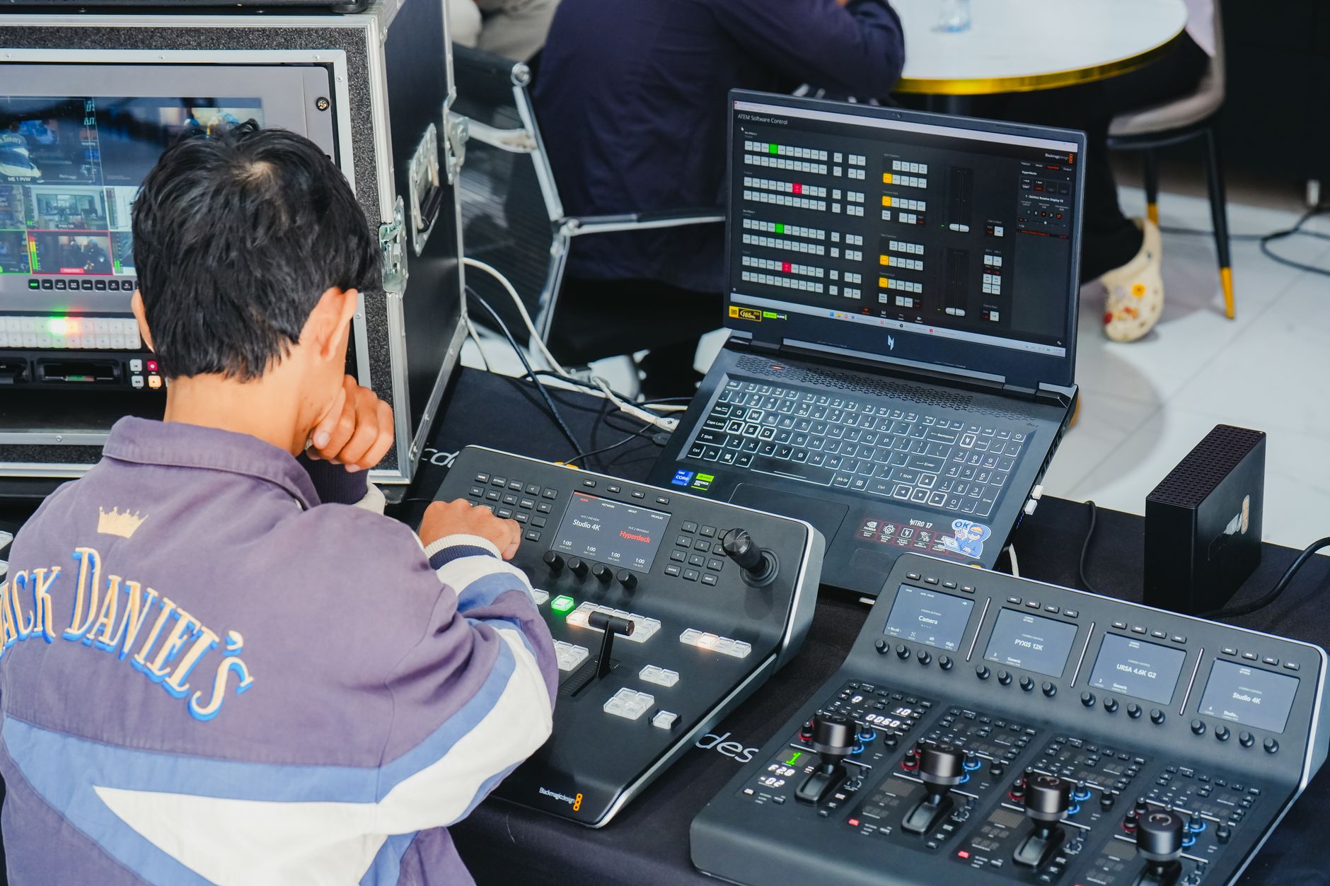Video Operation Room officials comparing multiple football camera angles on synchronized monitors