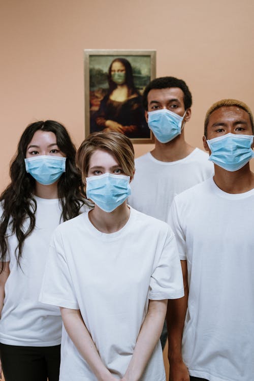 Free People Wearing Face Mask For Protection Stock Photo