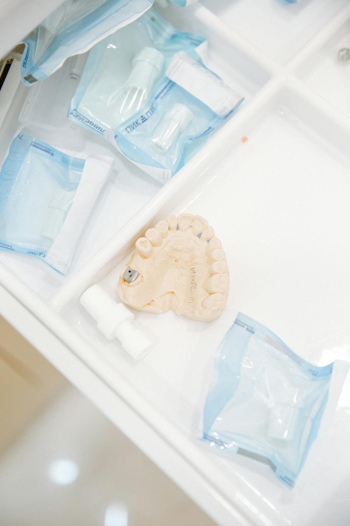 Family sitting together on a couch, supporting a sick family member