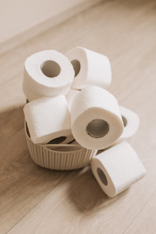 Free Toilet Paper Rolls on a Basket Stock Photo