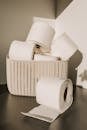 White Toilet Paper Roll on Woven Basket
