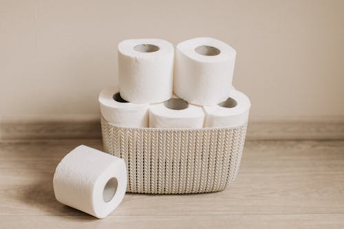 Free Toilet Paper Rolls on Basket Stock Photo
