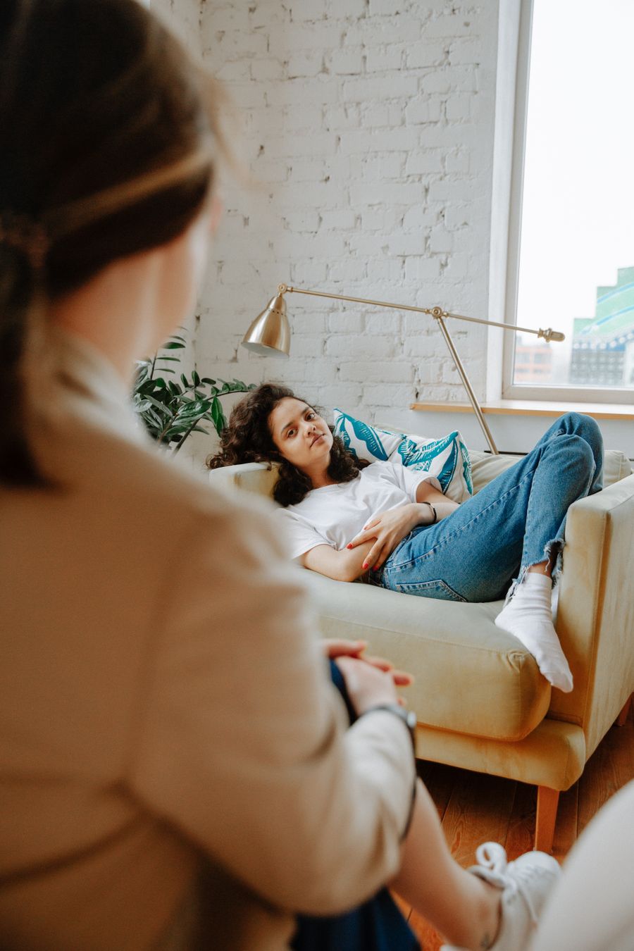 Client in a calm, supportive therapy session