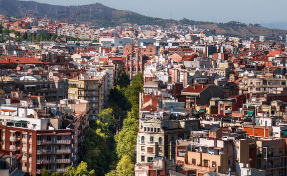 Explore the vibrant architecture of Barcelona from an elevated perspective, showcasing its unique urban landscape.