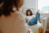 Woman Listening to Therapist