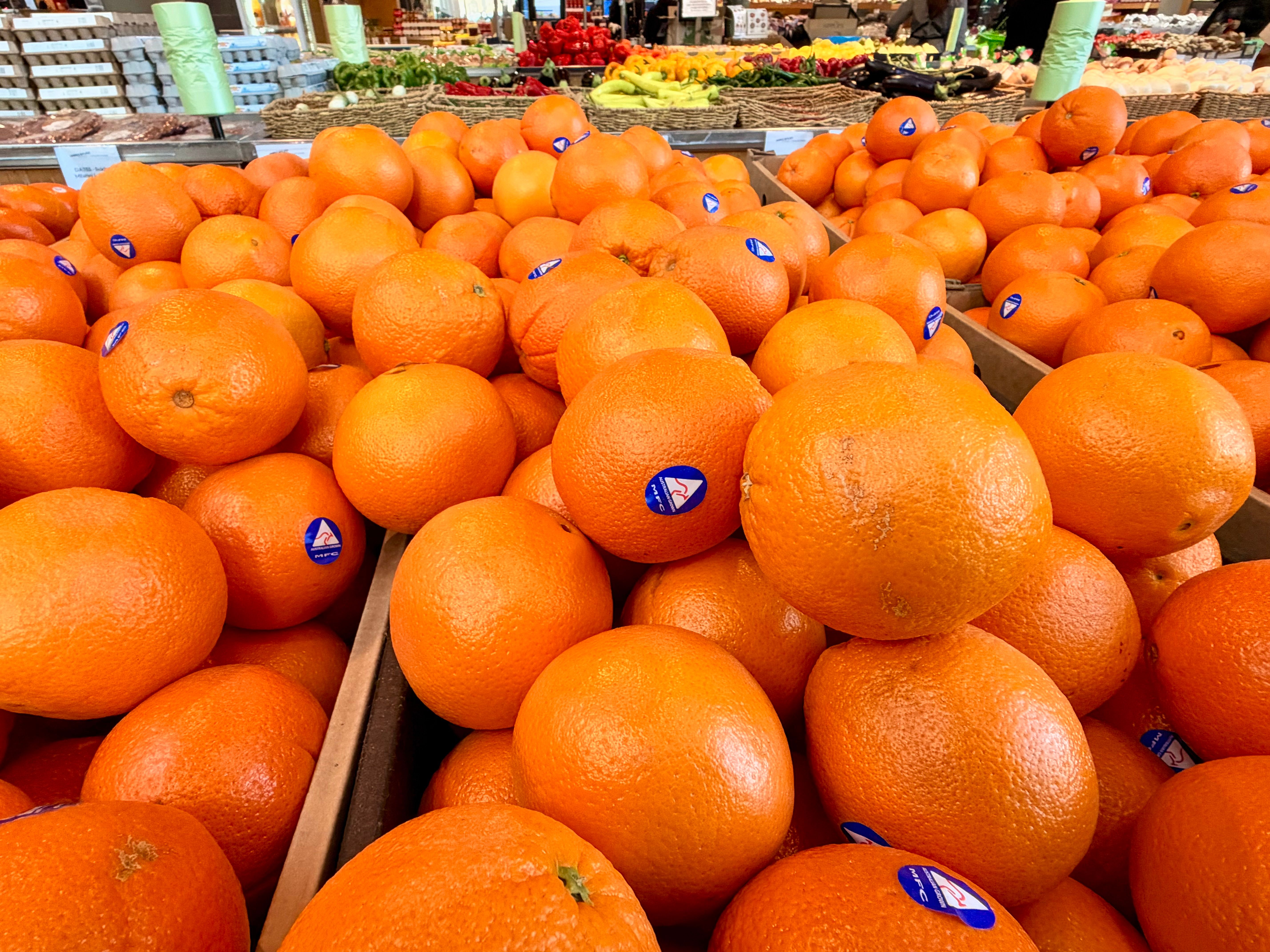 Vibrant display of fresh oranges at a market in Narre Warren, Victoria, Australia.