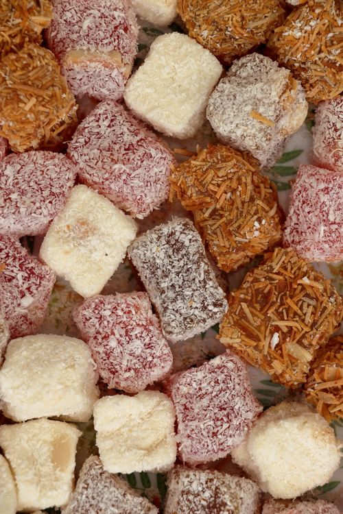 Free Colorful assortment of coconut-coated squares resembling Turkish delight in various colors. Stock Photo