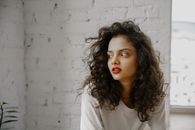 Woman in White Crew Neck Shirt