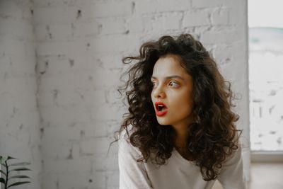 A woman reacting to news indoors, photo by Polina Zimmerman on Pexels